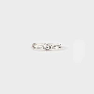 Silver pavé knot ring with double band detail