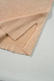 Tan ribbed knit pullover with asymmetric hem detail