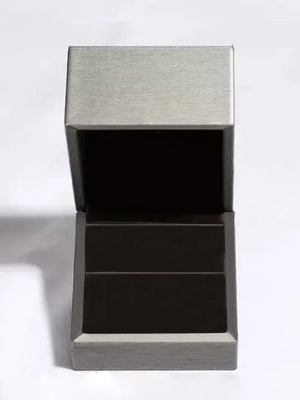 Silver jewelry box with open lid and dark interior.