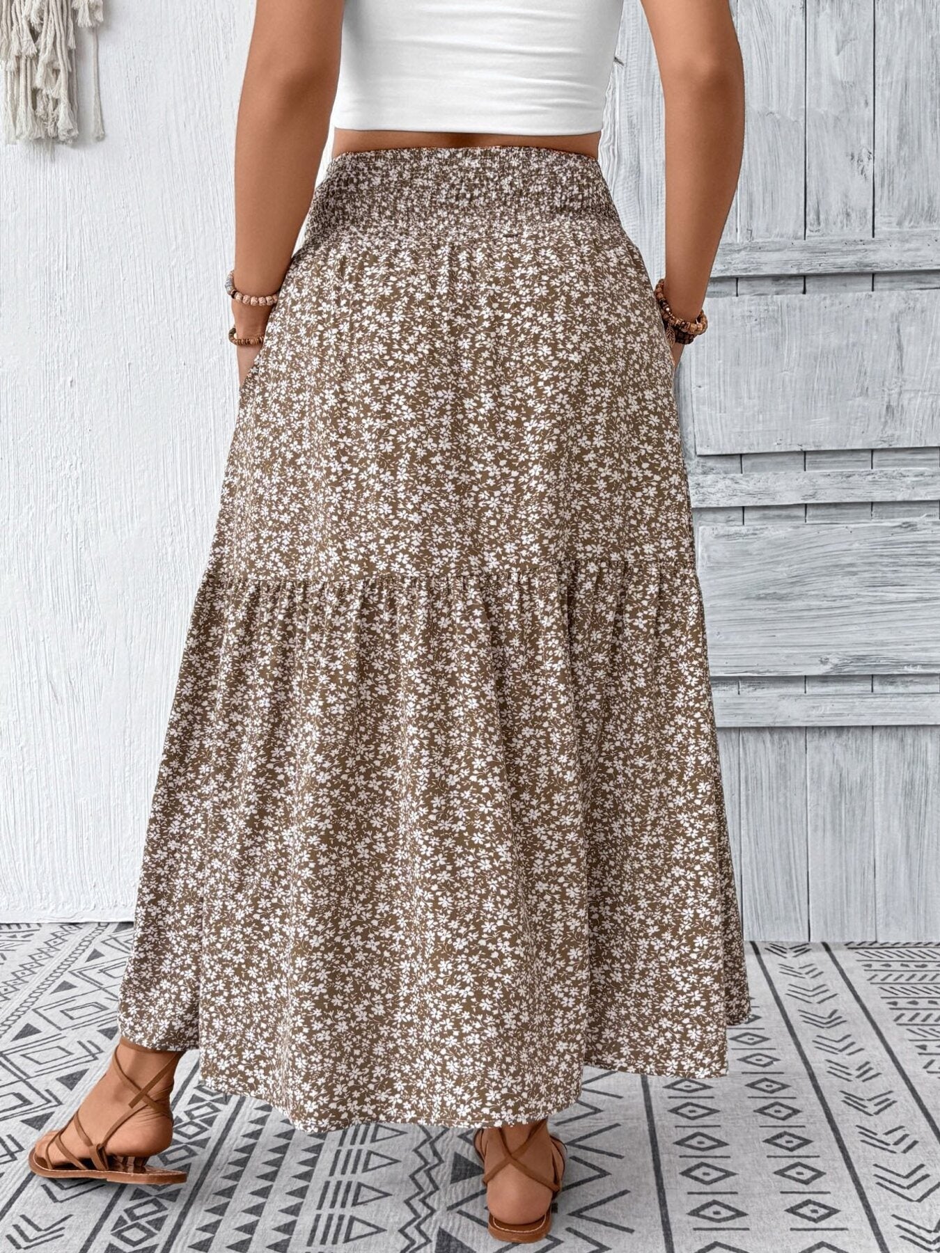 Tiered maxi skirt in mocha with a white floral print and smocked waist