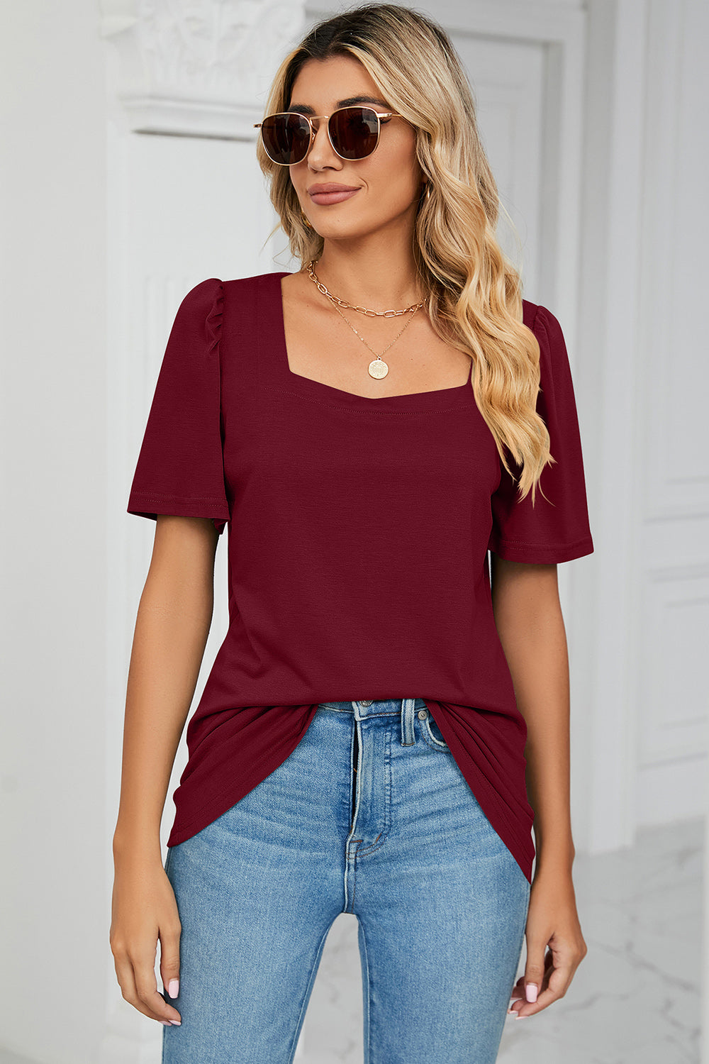 Burgundy tee with square neckline and sculpted short sleeves.