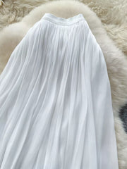 White pleated maxi skirt with a flowy, elegant cut.