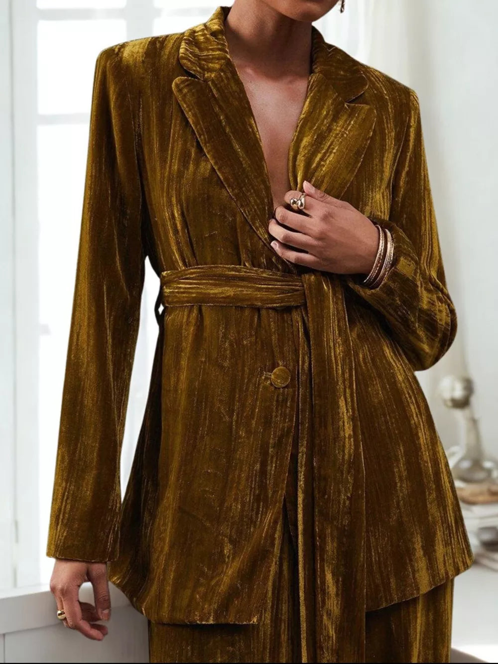 Belted velvet blazer and trousers ensemble in Army Green, featuring a single button closure and textured fabric.