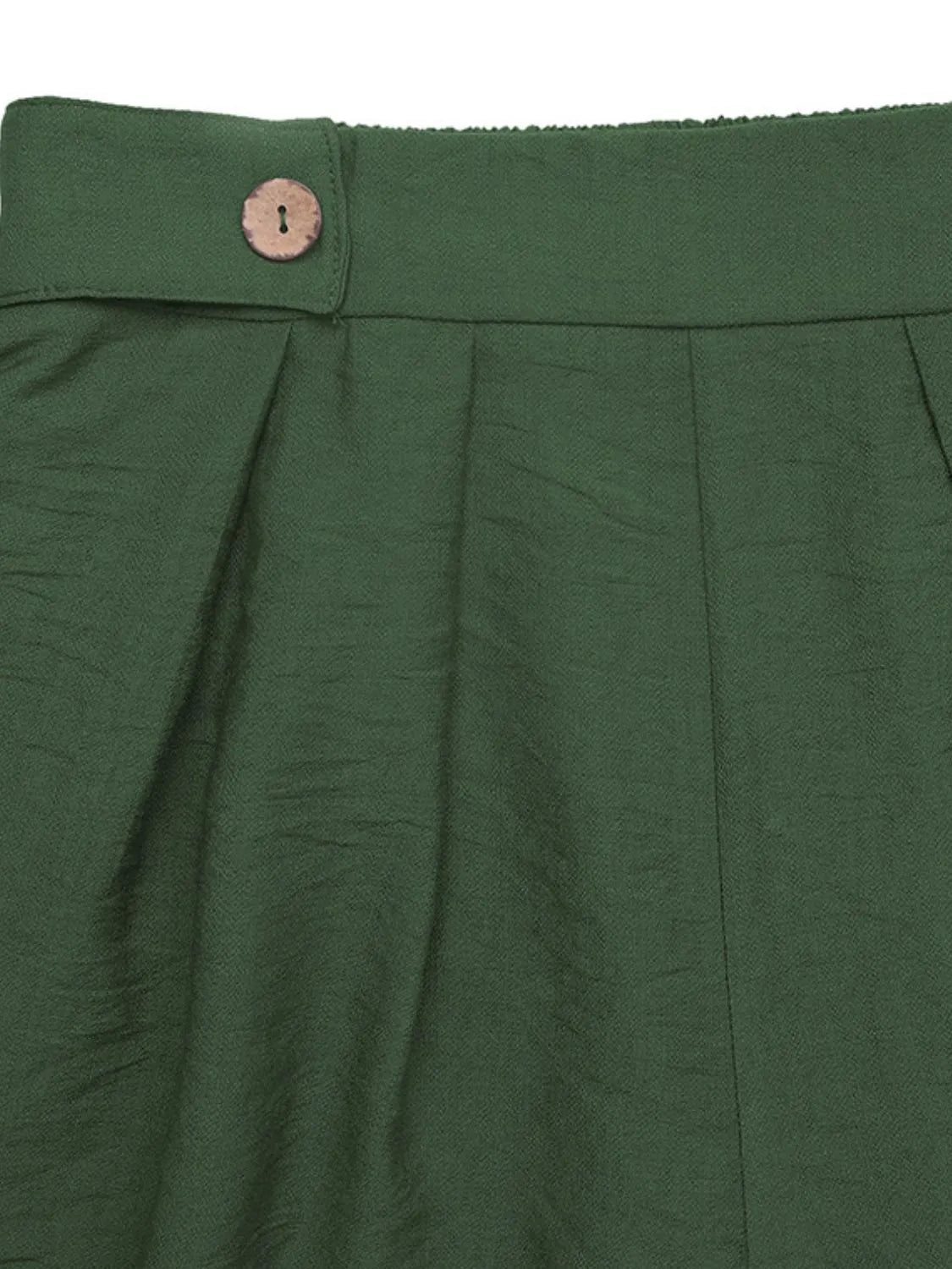 Dark green high-waisted pleated shorts with a single button detail at the waist.