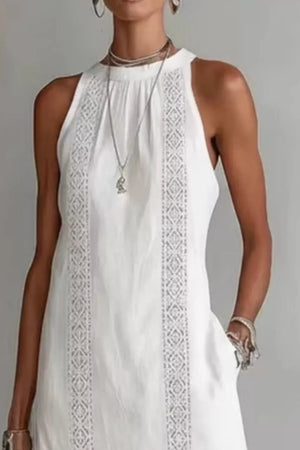 White midi dress with lace trim and pockets, sleeveless, high neck