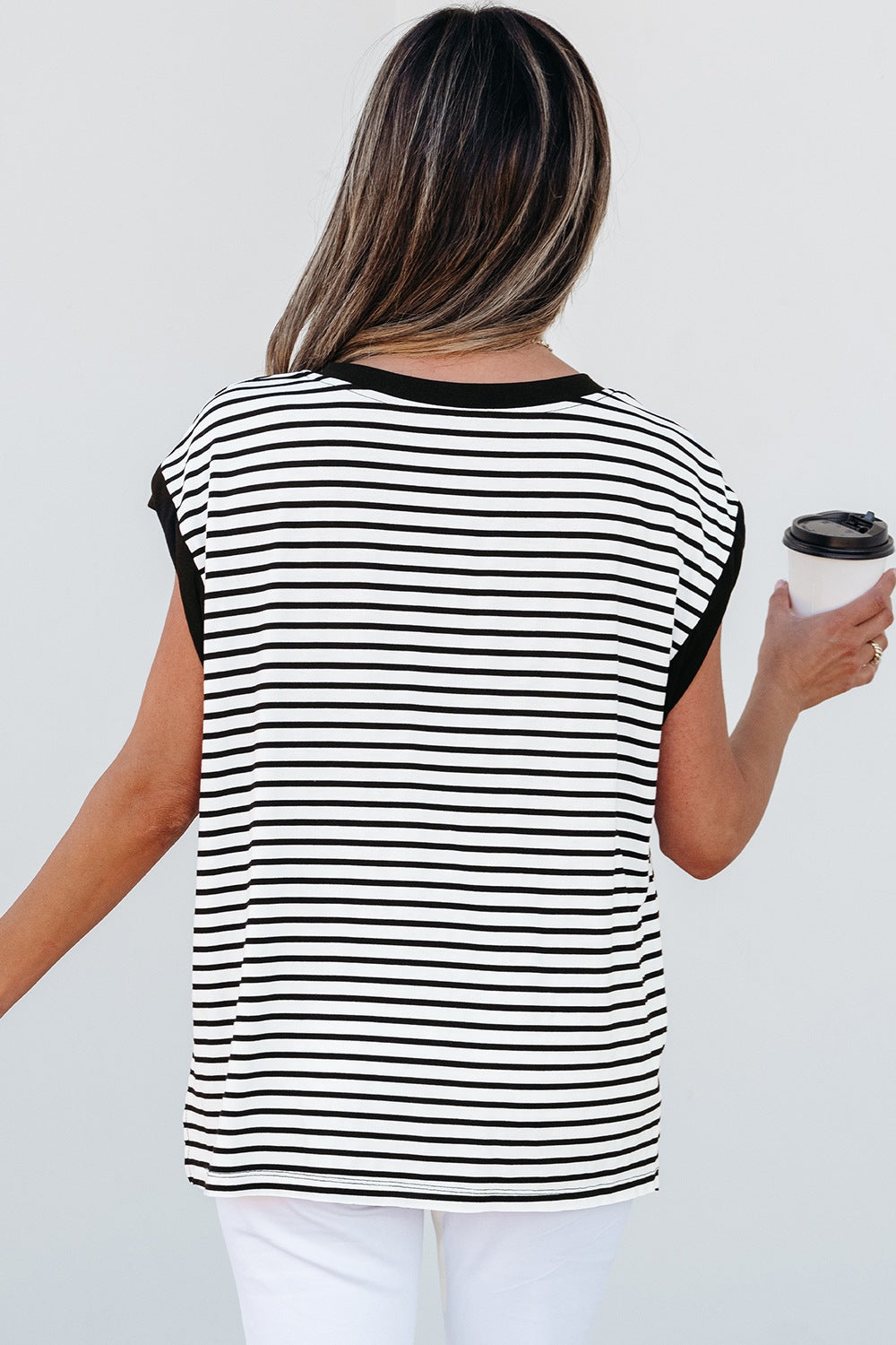 Black and white striped t-shirt with cap sleeves and a black neckline.
