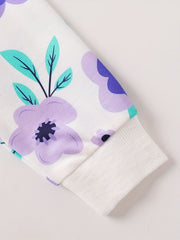 Baby top and bottom set with white fabric and purple floral print, featuring a ribbed cuff.