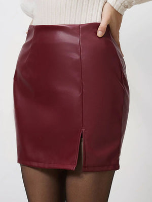 Deep red leatherette mini skirt with a front slit and high waist.