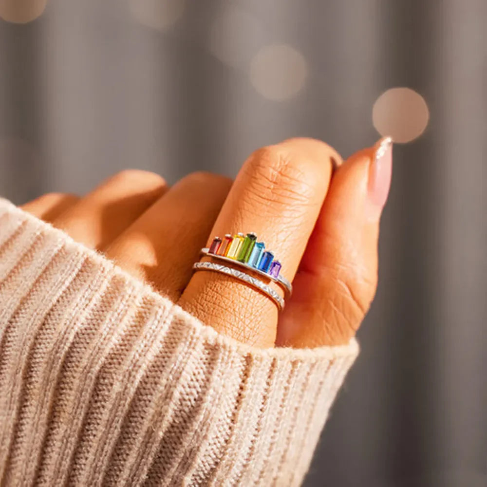 Rainbow Prism Stacked Sterling Ring Set with colorful baguette stones on a silver band.