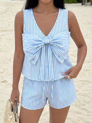 Blue and white striped two-piece set with a large bow detail on the top and drawstring shorts.