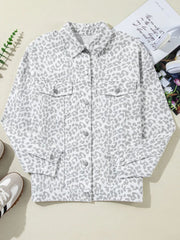 White denim jacket with stone-washed leopard print, button front, and chest pockets.
