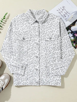 White denim jacket with stone-washed leopard print, button front, and chest pockets.