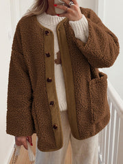 Brown teddy-texture button-up jacket with corduroy trim and pockets.