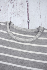 Light gray and white striped knit tee with contrast ribbed neckline.