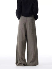 Men's wide-leg sweatpants in brown check with back pockets and a comfortable drape.