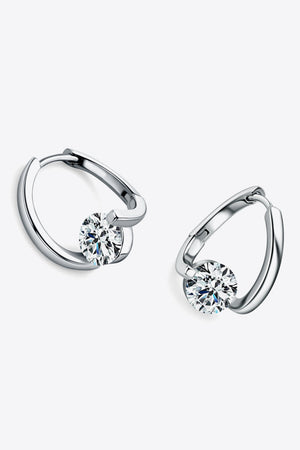 Silver hoop earrings with a single round diamond accent.