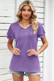 Flutter sleeve henley tee in lavender with tie-neck detail and layered sleeves.