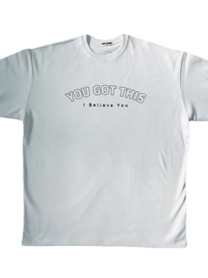 White oversized tee with "YOU GOT THIS I Believe You" graphic print