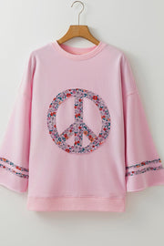 Dusty pink sweatshirt with floral peace sign applique and sleeve detail.
