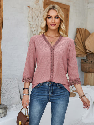 Dusty pink eyelet v-neck blouse with lace trim and 3/4 sleeves