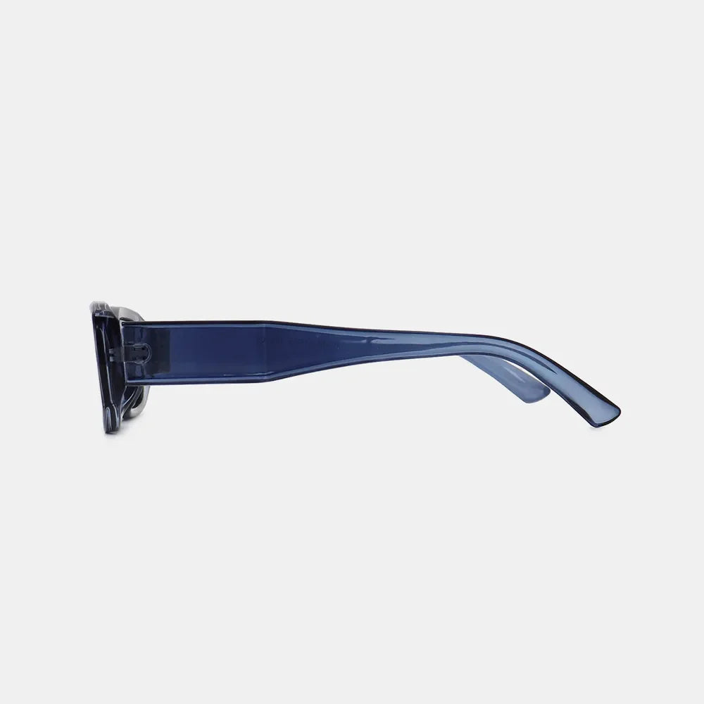 Chunky rectangular sunglasses in dusty blue with bold acetate frames.