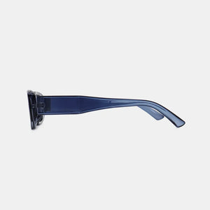 Chunky rectangular sunglasses in dusty blue with bold acetate frames.