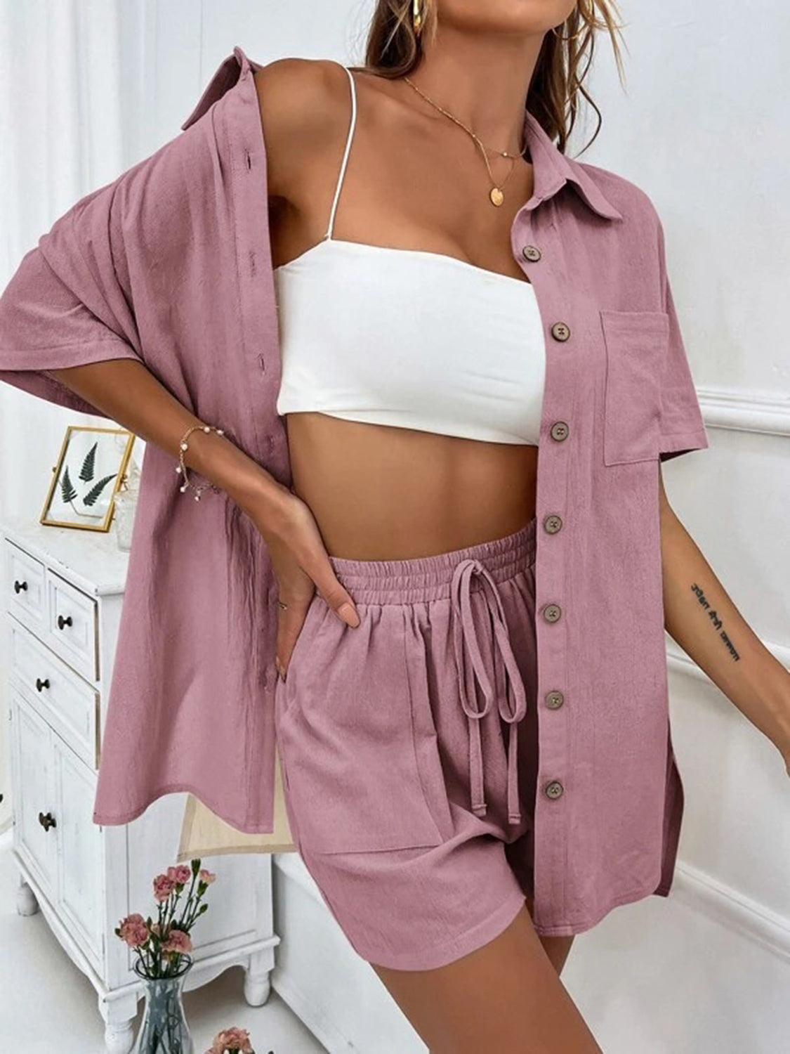 Pink linen shirt and shorts set with button front and drawstring waist