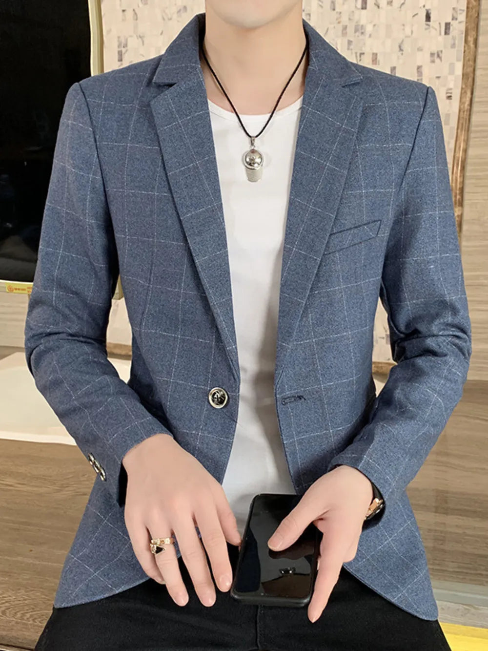 Light blue plaid sport jacket for men, button-down with notched lapels.