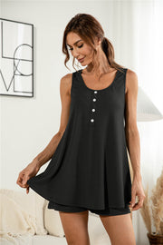 Black ribbed henley tank top with white buttons and matching shorts.