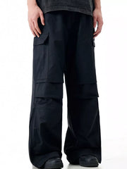 Black cargo sweatpants with multiple pockets and a relaxed fit.