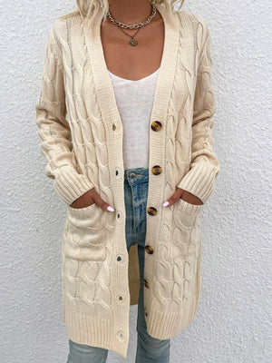 Tan cable knit button-down cardigan with pockets and brown buttons