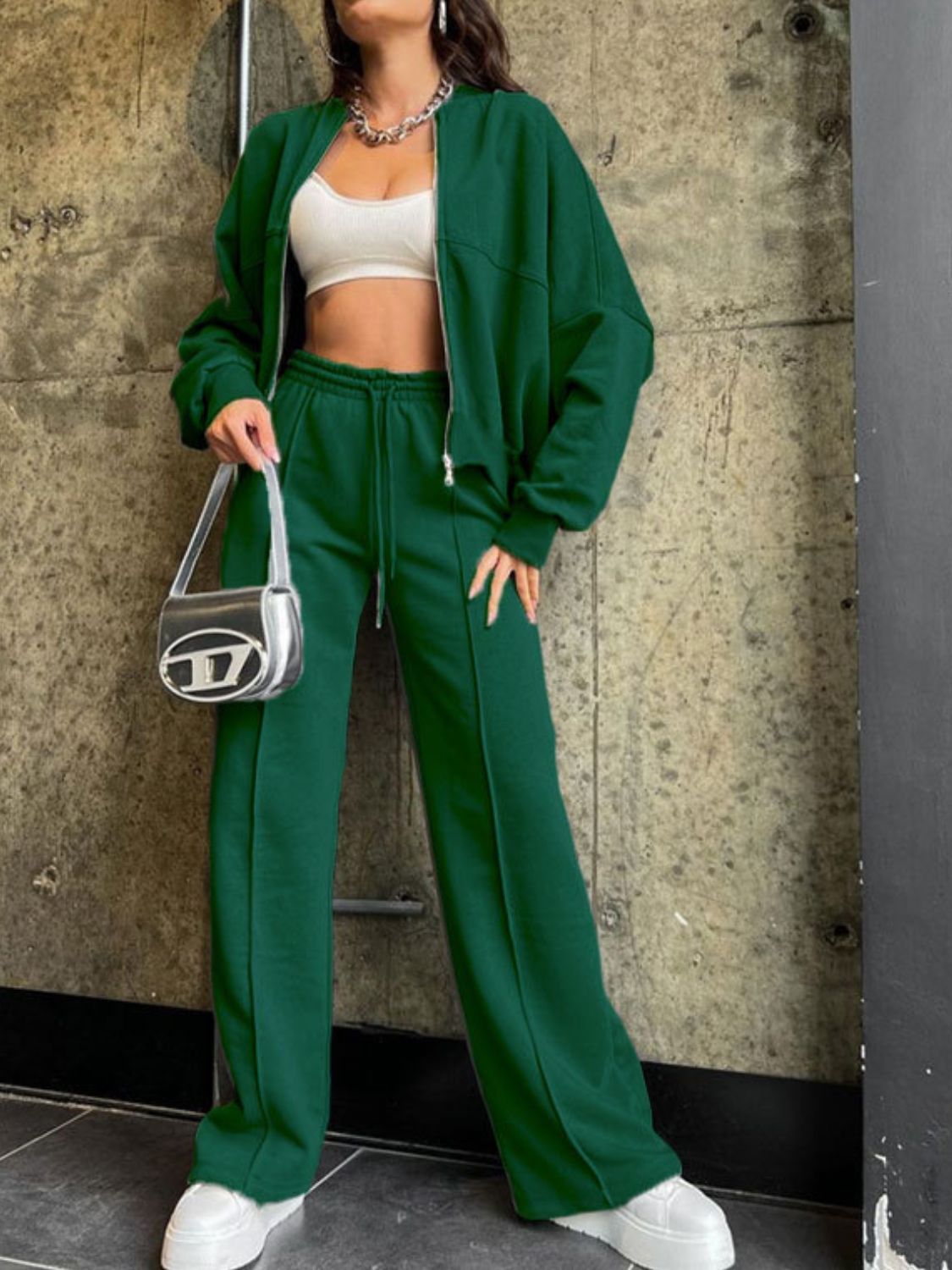 Dark green zip-up jacket and wide-leg pants coord set with drawstring waist.