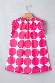 Polyester tank top with playful pink polka dots and ruffled sleeves.