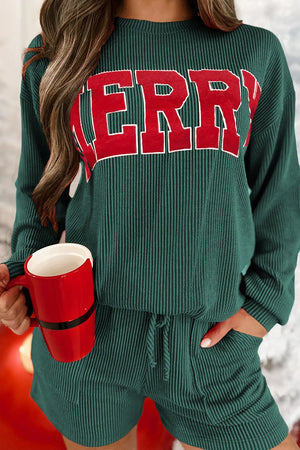 Textured Black Forest loungewear set with "Merry" graphic and drawstring shorts.