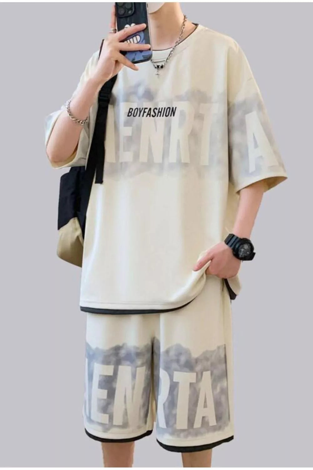 Oversized cream lettered tee and shorts set with black trim and graphic print.