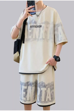 Oversized cream lettered tee and shorts set with black trim and graphic print.