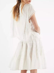 Tiered drawstring mini skirt in white with lace trim detail