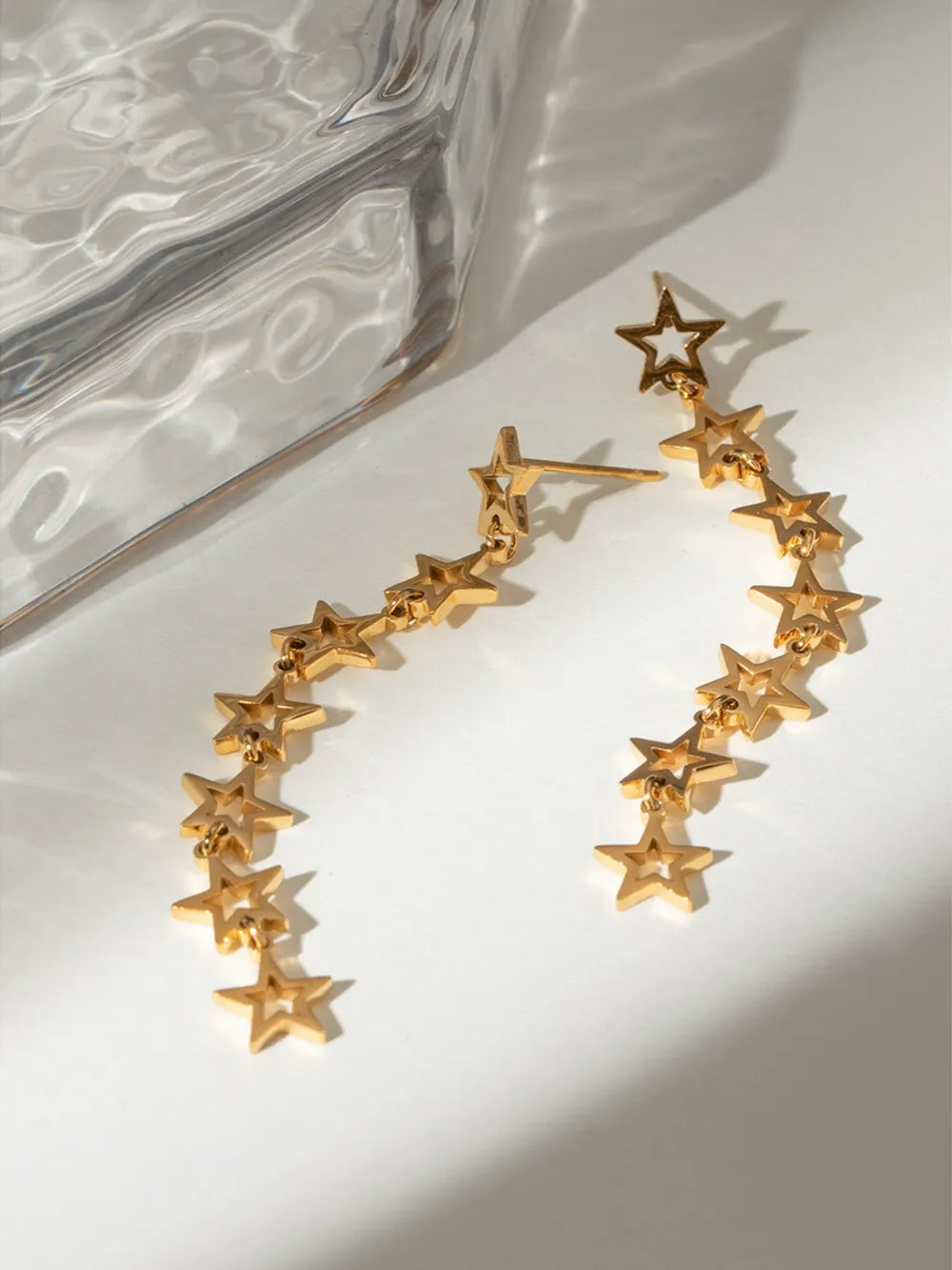 Gold celestial star cascade dangling earrings
