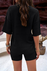 Black textured knit tee and biker shorts set with short sleeves and a crew neck.