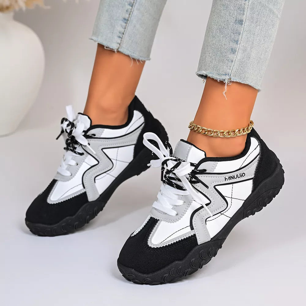 Round Toe Lace Up Sneakers in Black, model styling view