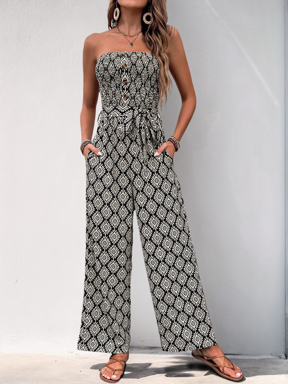 Black geometric print bandeau jumpsuit with belt and wide legs
