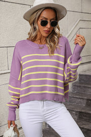 Lavender and yellow striped boxy knit sweater with crew neck and long sleeves.