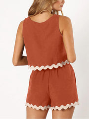 Orange-Red outfit set with scalloped trim detail on crop top and shorts.