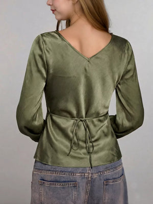 Elegant V-neck tie-front satin maternity blouse with long sleeves in olive green.