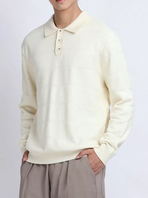 Apricot knit polo shirt with button accents and subtle horizontal stripe texture.
