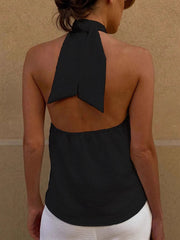 Black backless halter cami with a twisted tie detail at the neck.