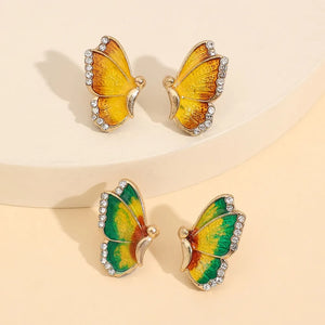 Enamel winged stud earrings with crystals in yellow and multicolor butterfly designs.