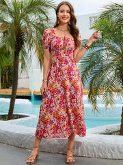 Floral puff sleeve midi dress with square neckline and tie detail in multicolor blooms.