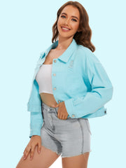 Aqua distressed denim trucker jacket with button closure and crystal fringe detail.