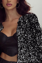 Black sequin embellished cropped open jacket with a satin bustier top.